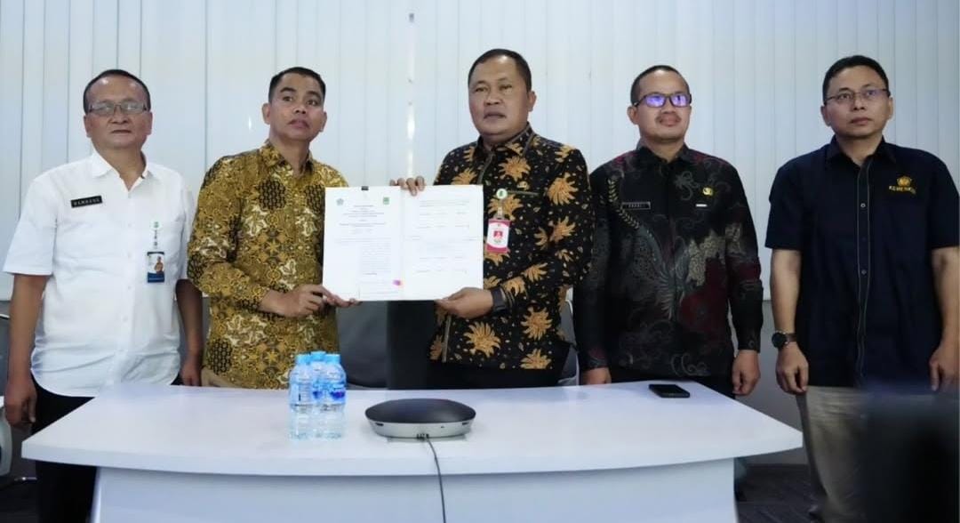 Bapenda Karawang Tandatangani Kerja Sama Optimalisasi Pemungutan Pajak Pusat dan Daerah