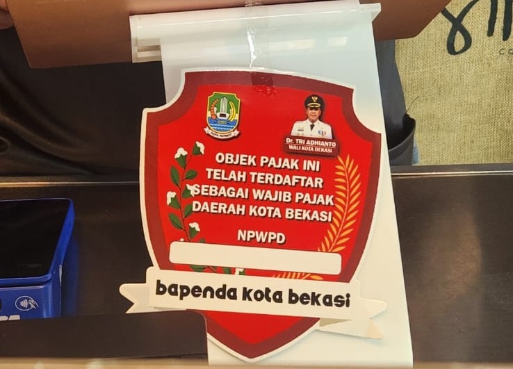  PJ. Wali Kota Bekasi Diminta Tegas  ke OPD Masih Menyisipkan Gambar eks Walkot di Pengumuman 