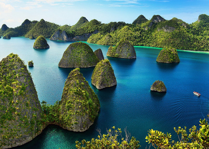 Destinasi Wisata Terfavorit di Papua,  Inilah 5 Fakta Menari Raja Ampat